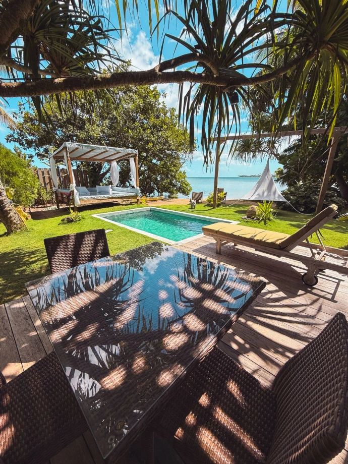 Villa Hotu exterior with private pool and tropical garden at Villa Mitirapa, Tahiti